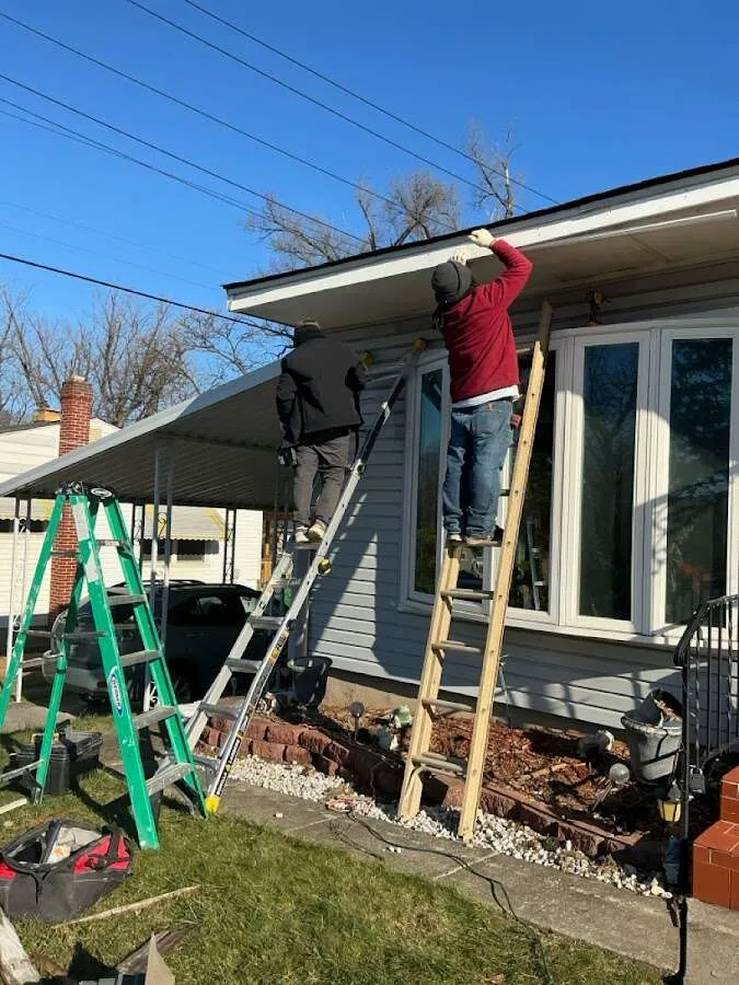 Restoration crew performing exterior repair in Gentry